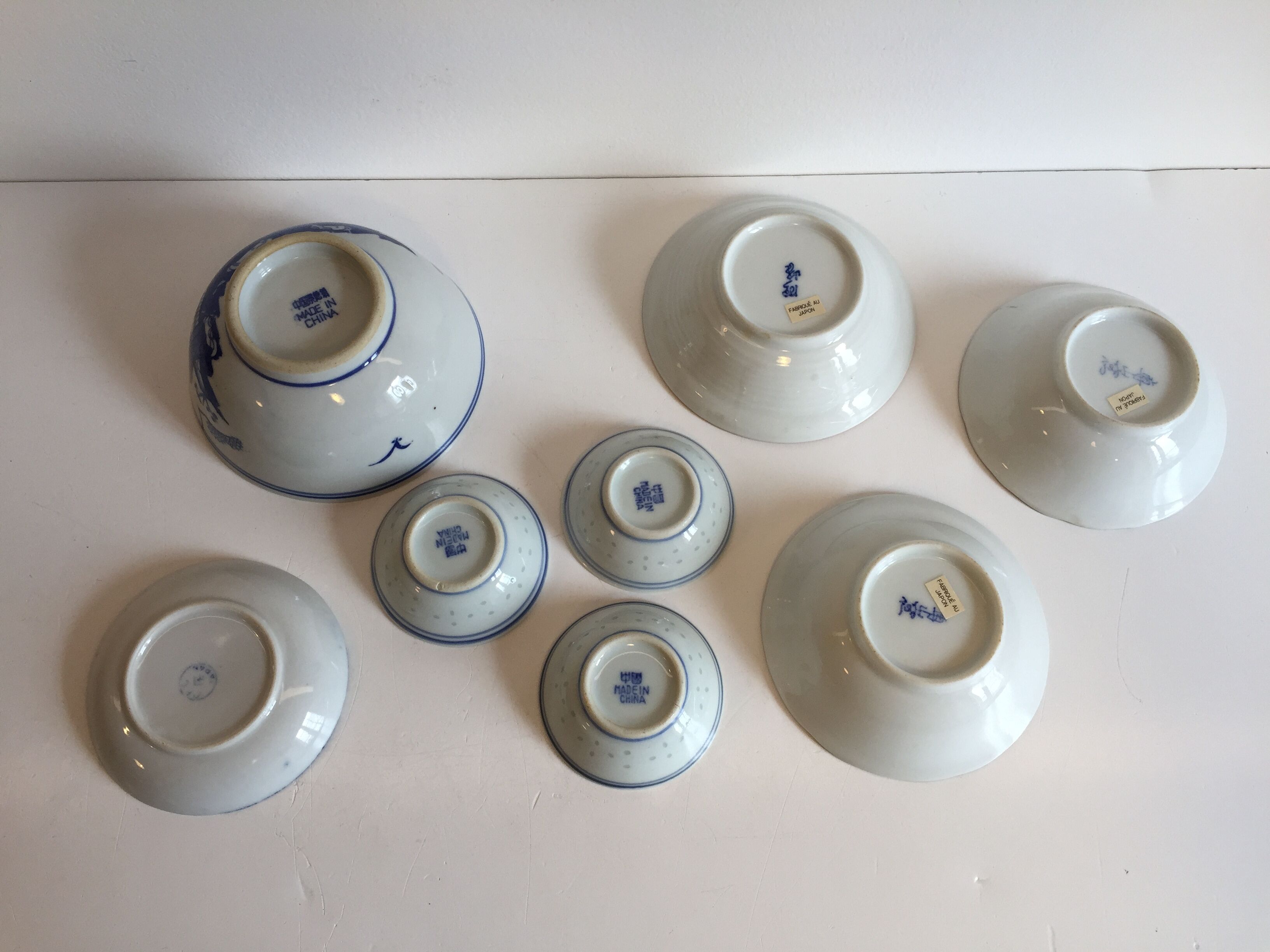 set of 4 bowls and 4 asian porcelain cups