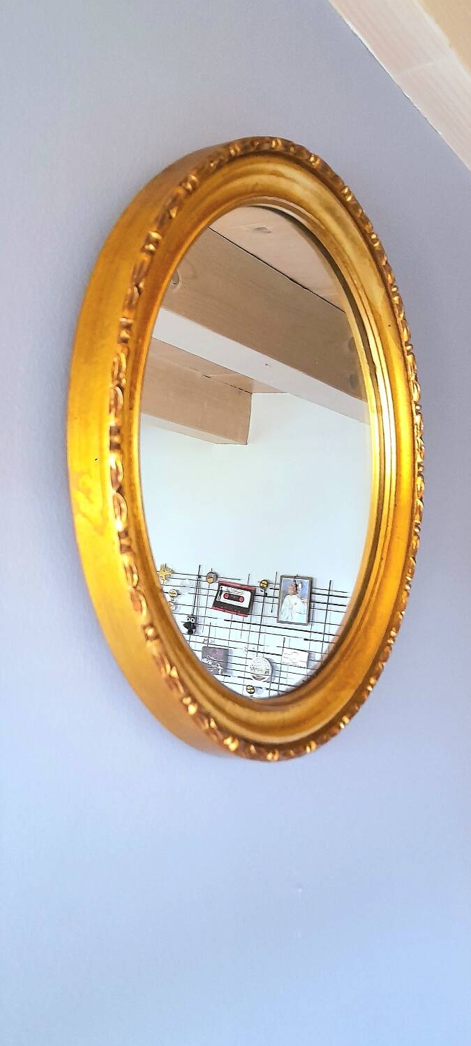 Round golden mirror