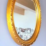 Round golden mirror