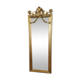 Mirror with an angel in gilded wood and stucco 166x61cm