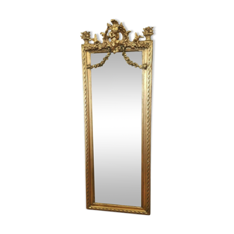 Mirror with an angel in gilded wood and stucco 166x61cm