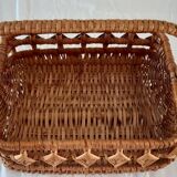Old wicker basket with diamond-shaped decorations