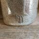 Pitcher in stoneware signed Jean Claude Monange, daisy motif yellow heart
