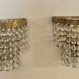 Pair of brass sconces and tassels