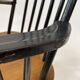 Vintage easy chair with high back and armrest from the 60s