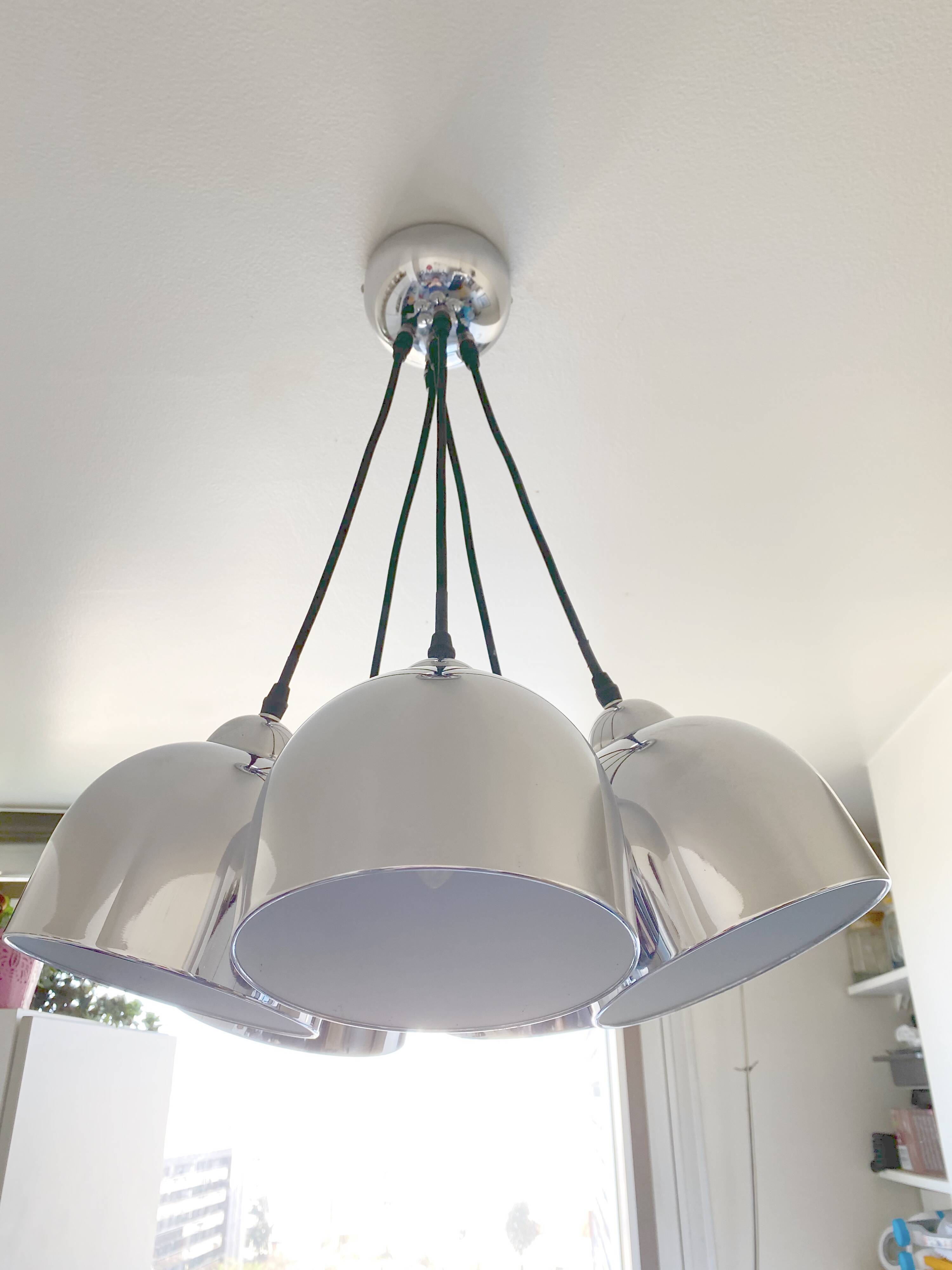 Suspended bell luminaires