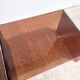 Pair of vintage smoked plexiglass nesting tables.
