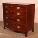 Commode bombée en acajou et incrustations, circa 1800