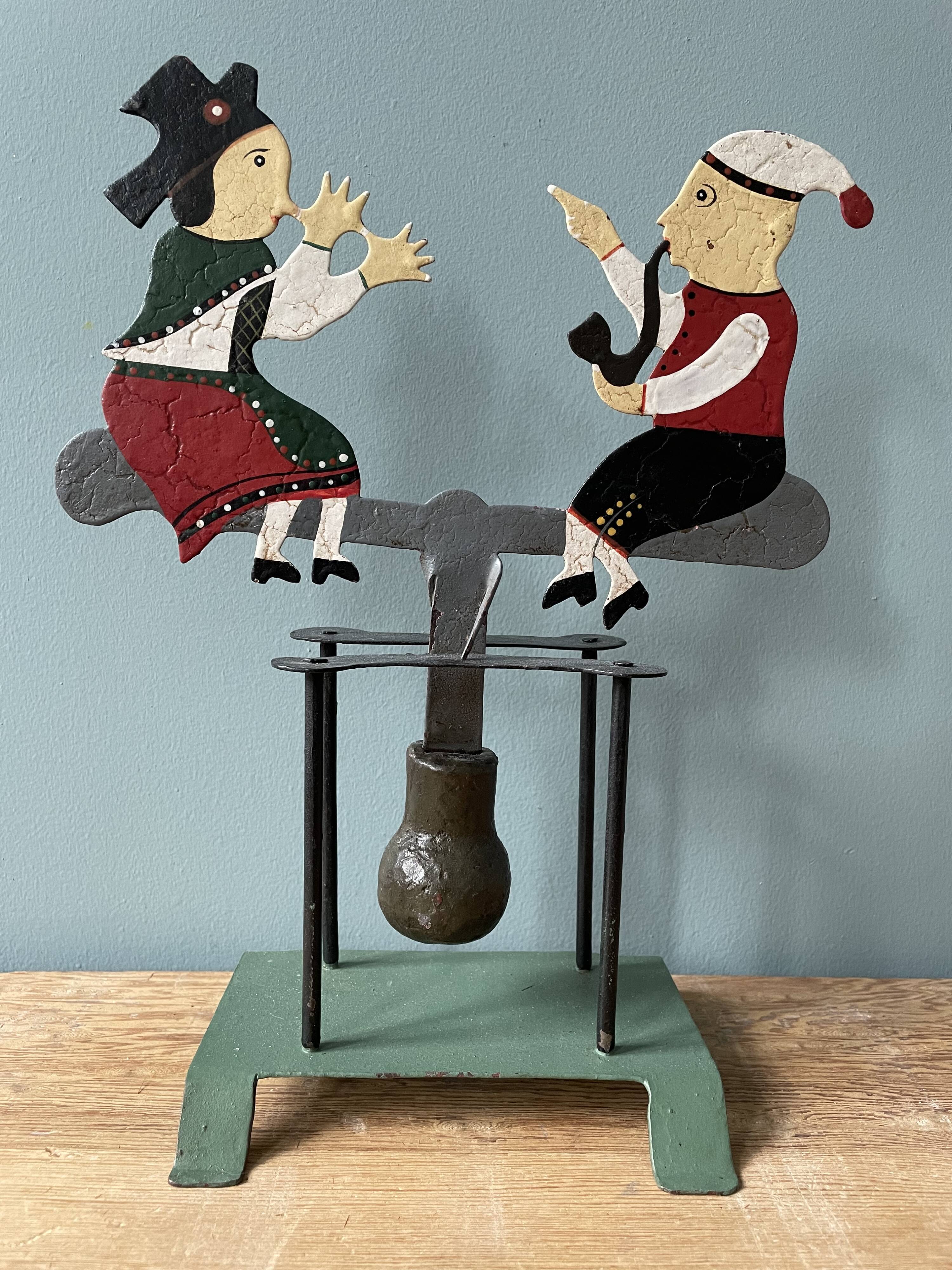 Old mobile toy with pendulum