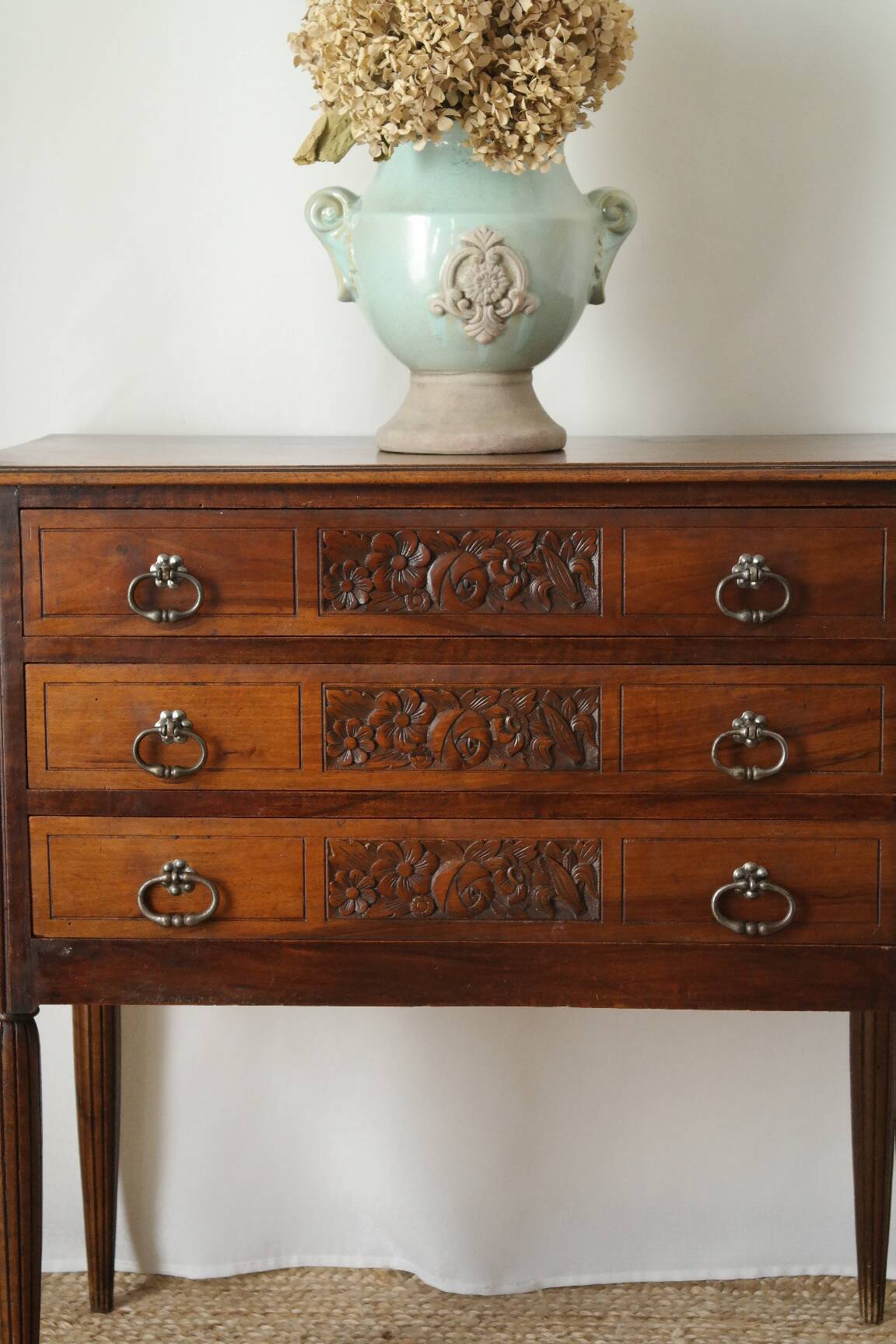 Solid walnut chest of drawers from the early 20th century.