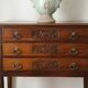 Solid walnut chest of drawers from the early 20th century.