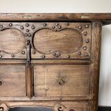 Very old elm wood with carved patterns and ironwork pieces.