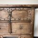 Very old elm wood with carved patterns and ironwork pieces.