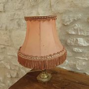 Vintage lamp, pink fringed pagoda shade and brass base.