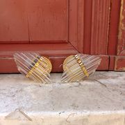 Pair of wall sconces in crystal glass and gilded brass. Venini style.