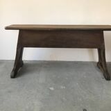 Art and Crafts style organ bench in solid oak.