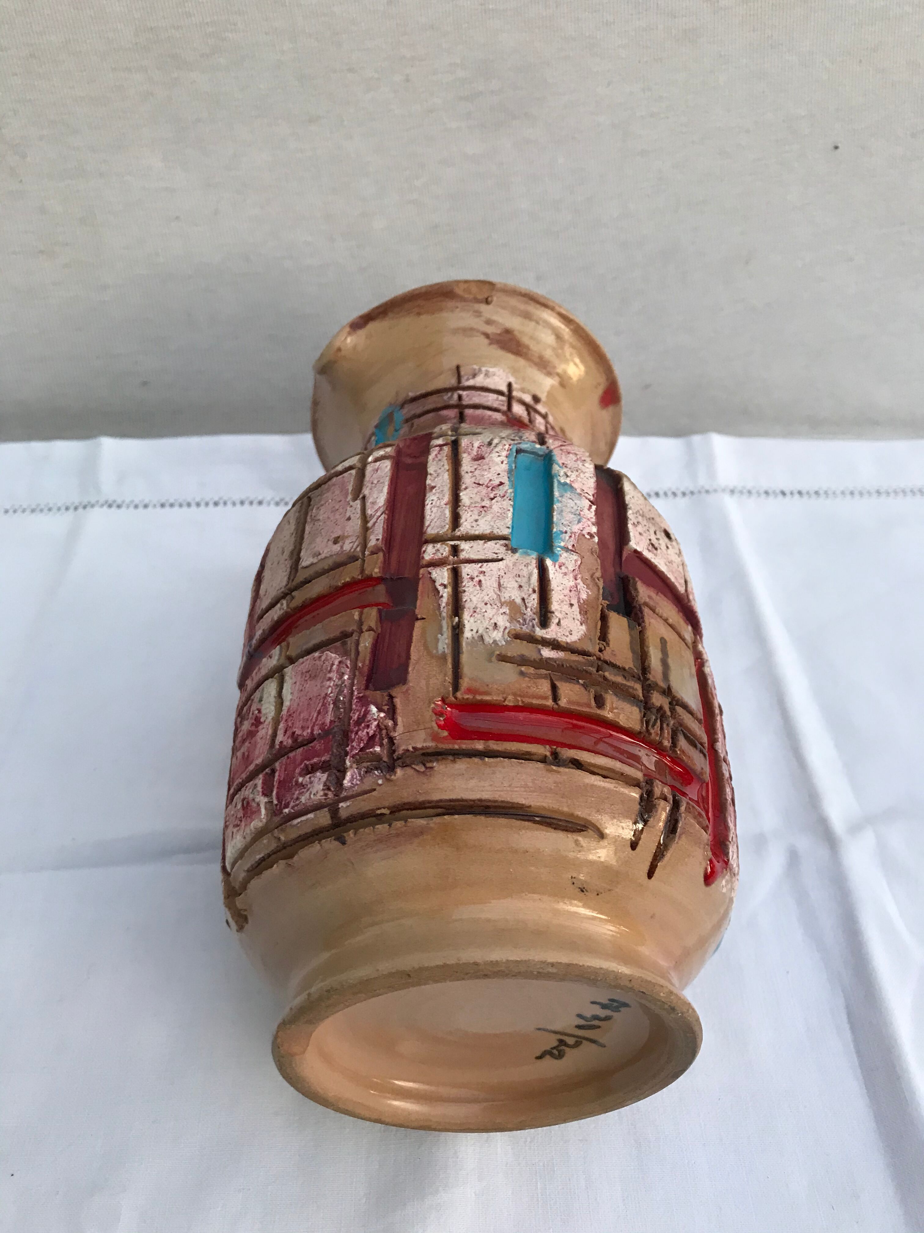 Former beige ceramic pitcher