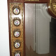 Mirror in gilded bronze and mahogany wood Medallion porcelain decoration.