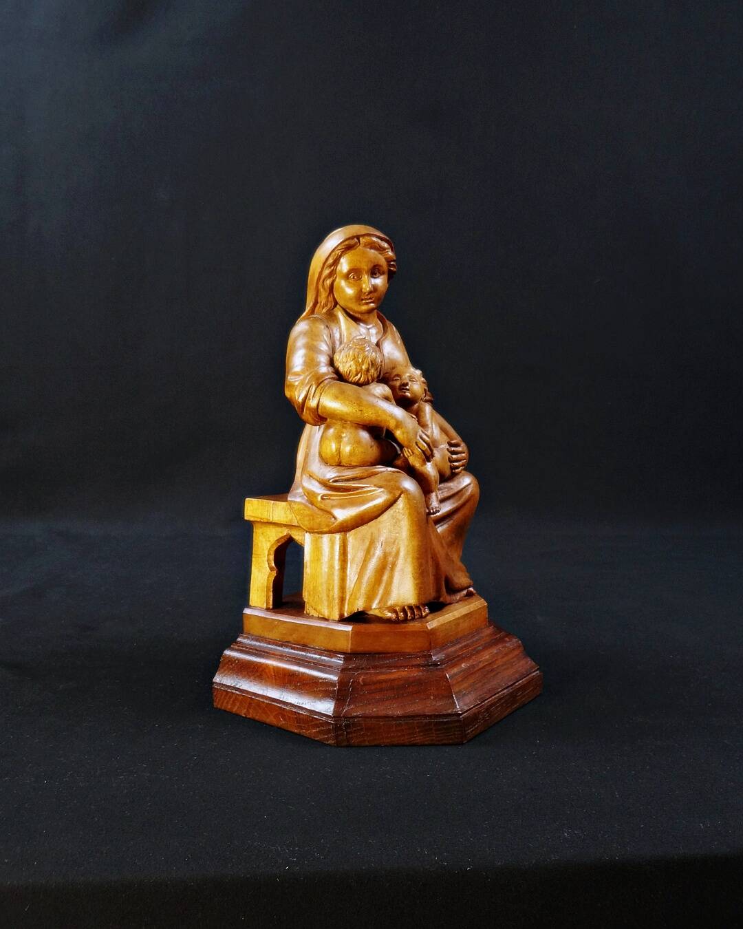 Virgin breastfeeding the Child Jesus and Saint John religious sculpture wood