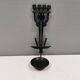 Vintage wall candle holder in wrought iron and hard pressed blue glass.