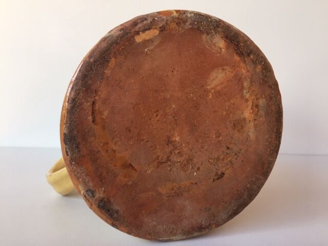 Glazed earth pitcher