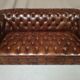 Upholstered chesterfield brown sofa
