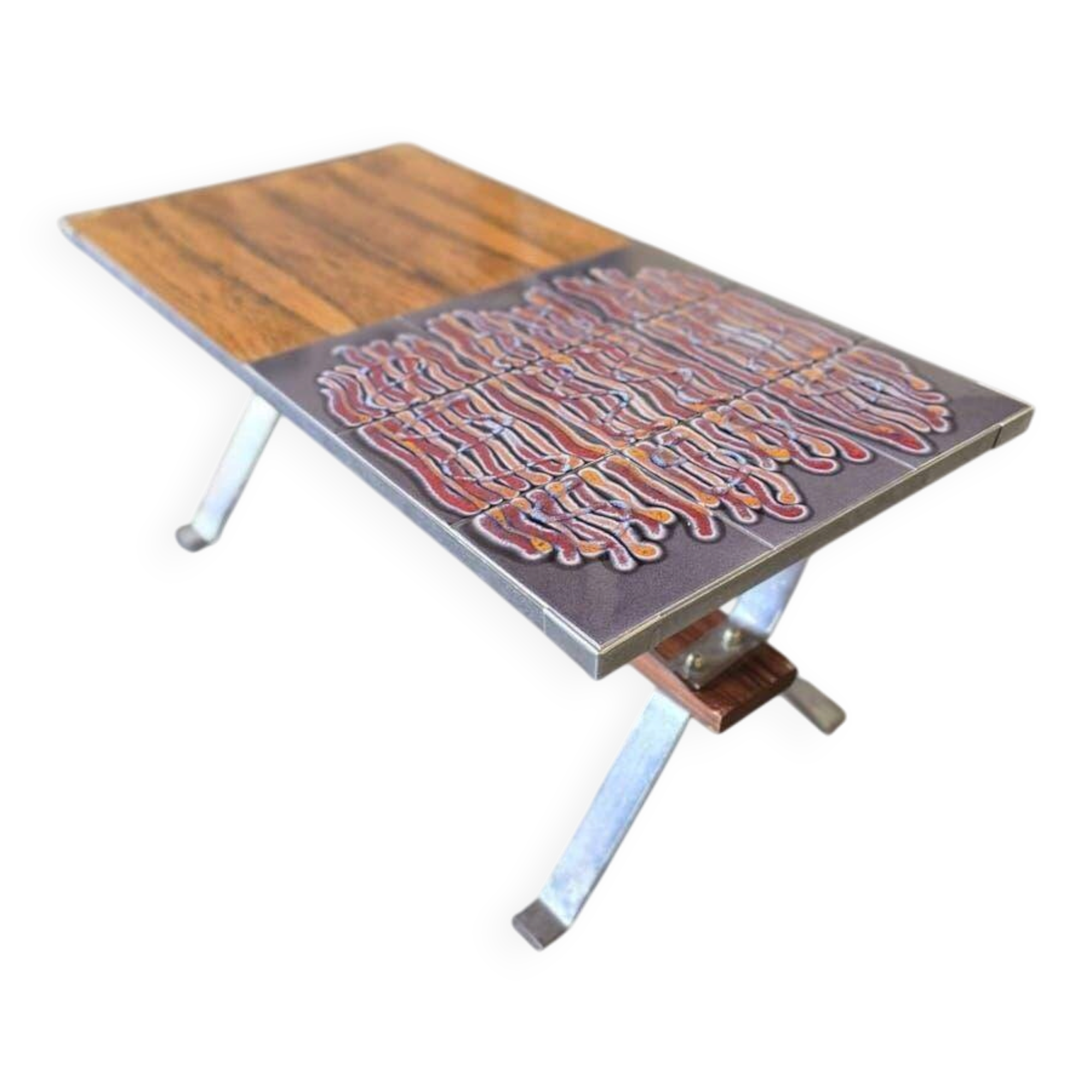 Vintage chrome coffee table with ceramic accent.