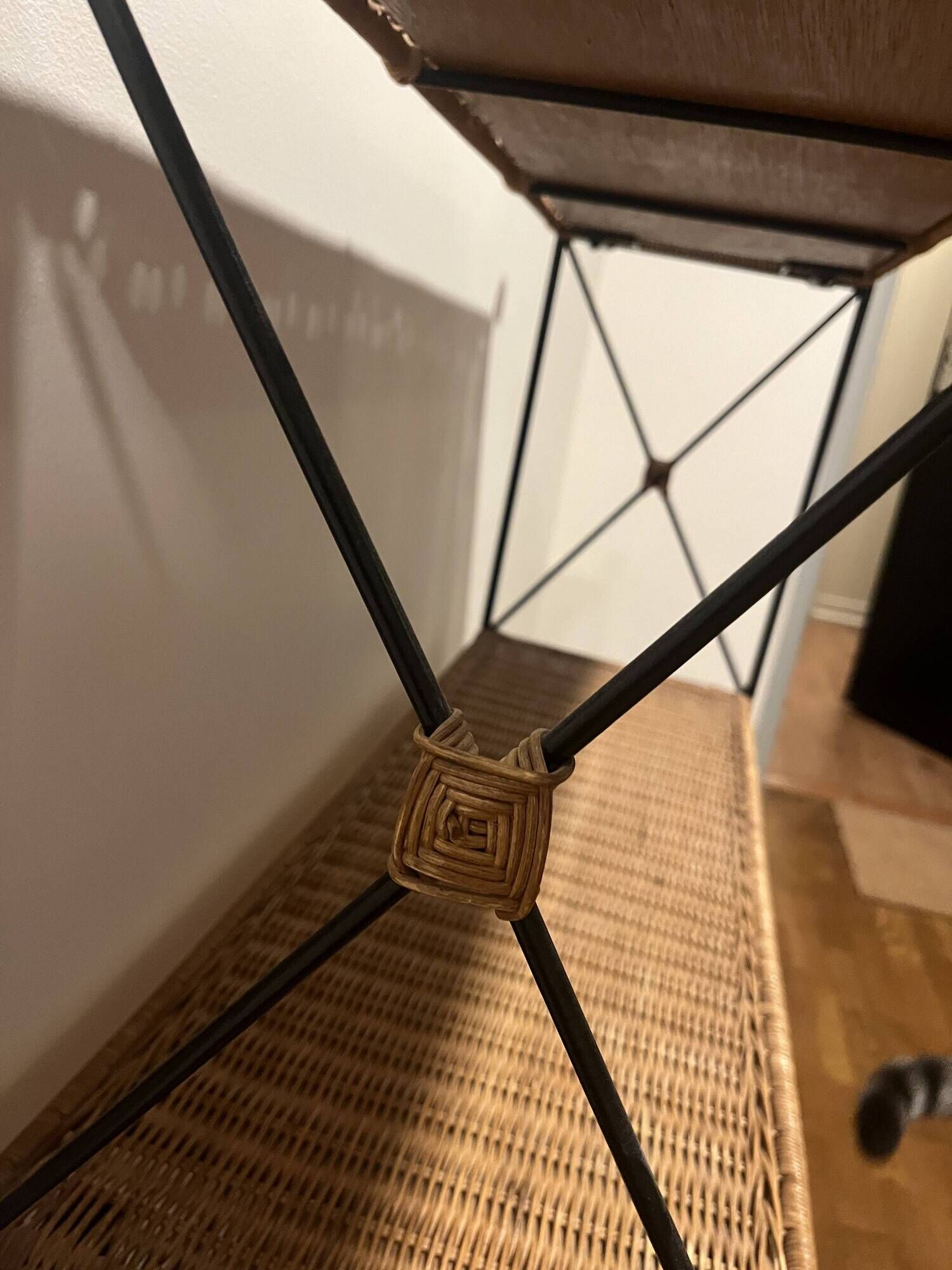 Rattan and wrought iron shelf