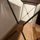 Rattan and wrought iron shelf
