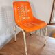 Chair with openwork plastic shell 1970