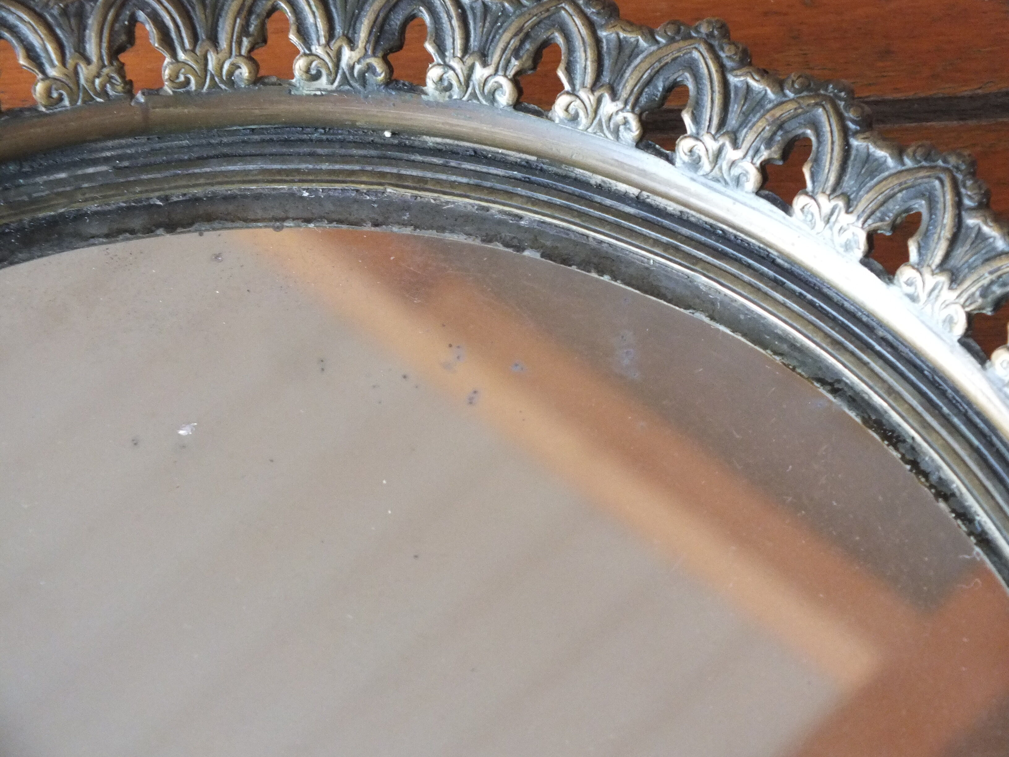 Antique mirror glass centerpiece in bronze and mirror glass