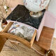 Art Deco bedside table in powder pink painted wood.