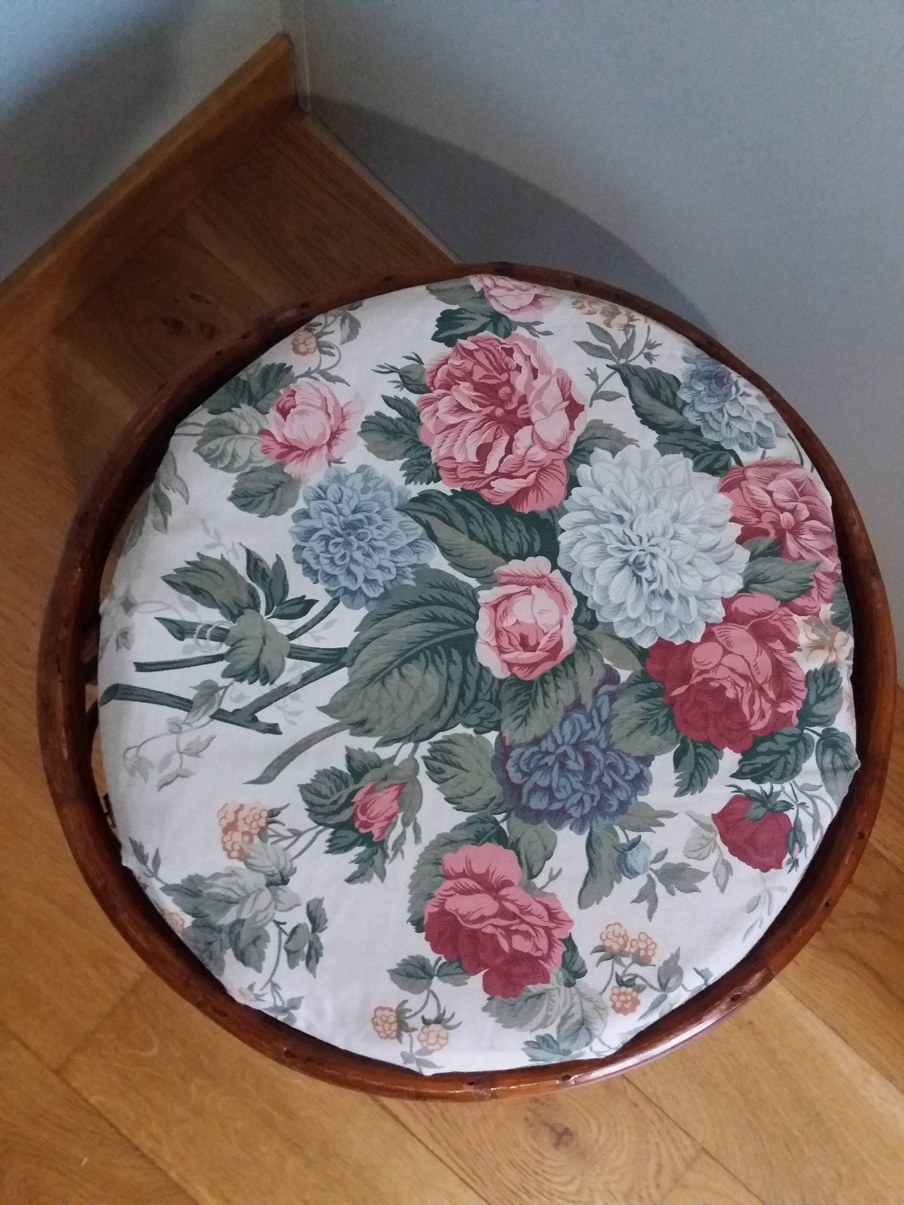 Wicker pouf with cushion