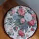 Wicker pouf with cushion
