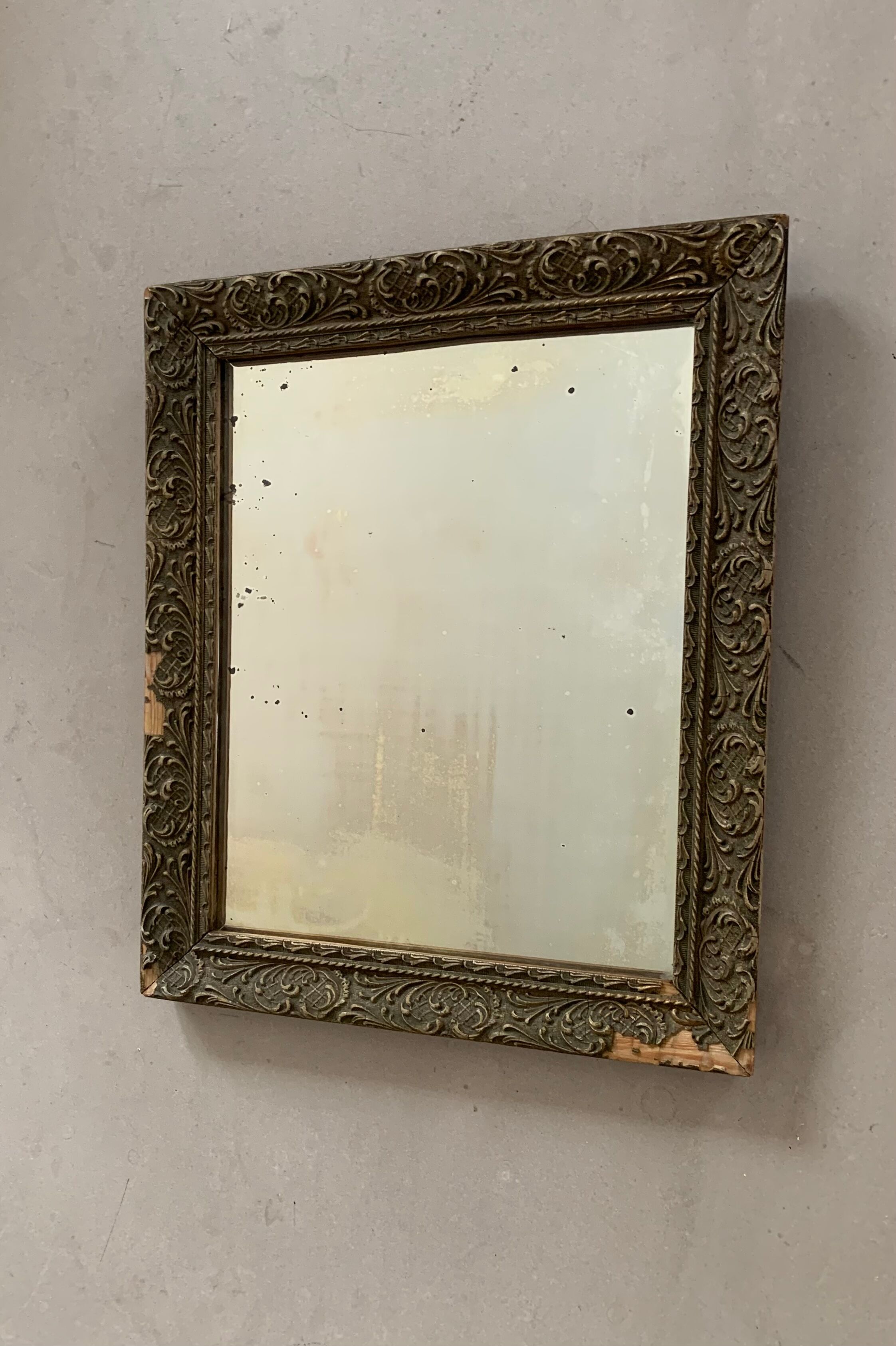 Old stitched golden mirror