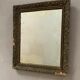Old stitched golden mirror