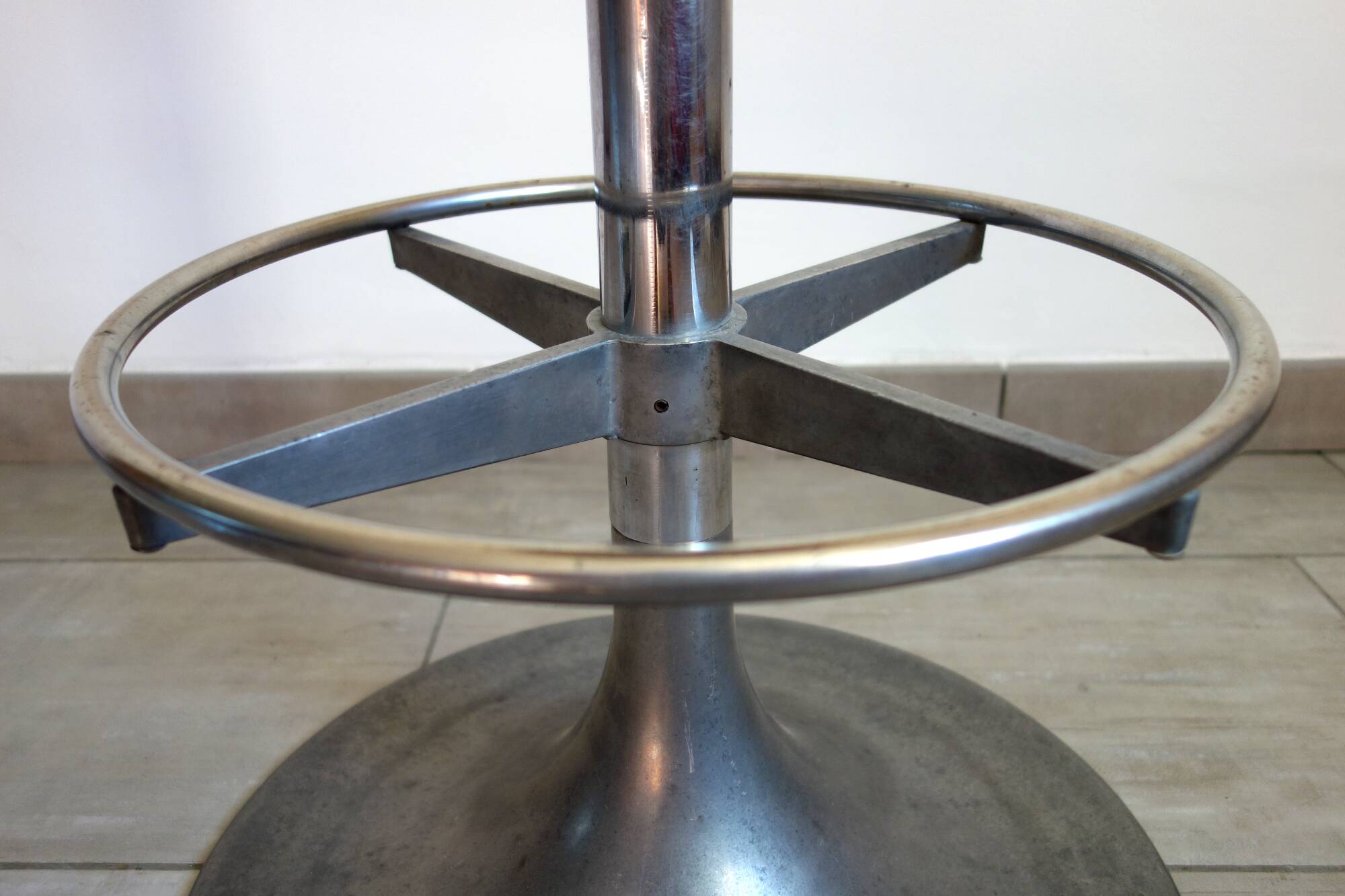 Vintage high stool in cast aluminum and sheepskin