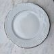 Silver-edged dessert service and its dish