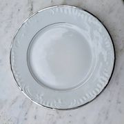 Silver-edged dessert service and its dish