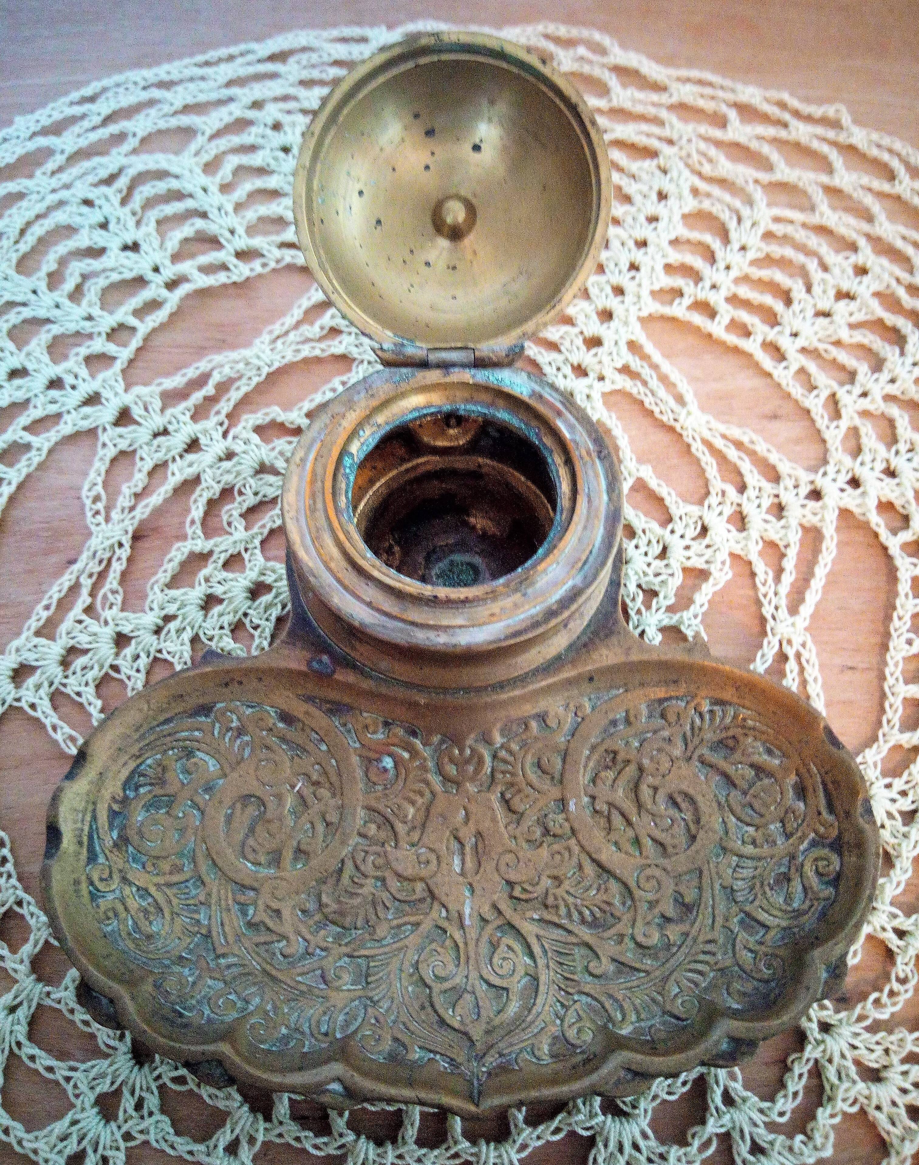 Old bronze inkwell