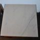 Pair of wooden and marble side tables
