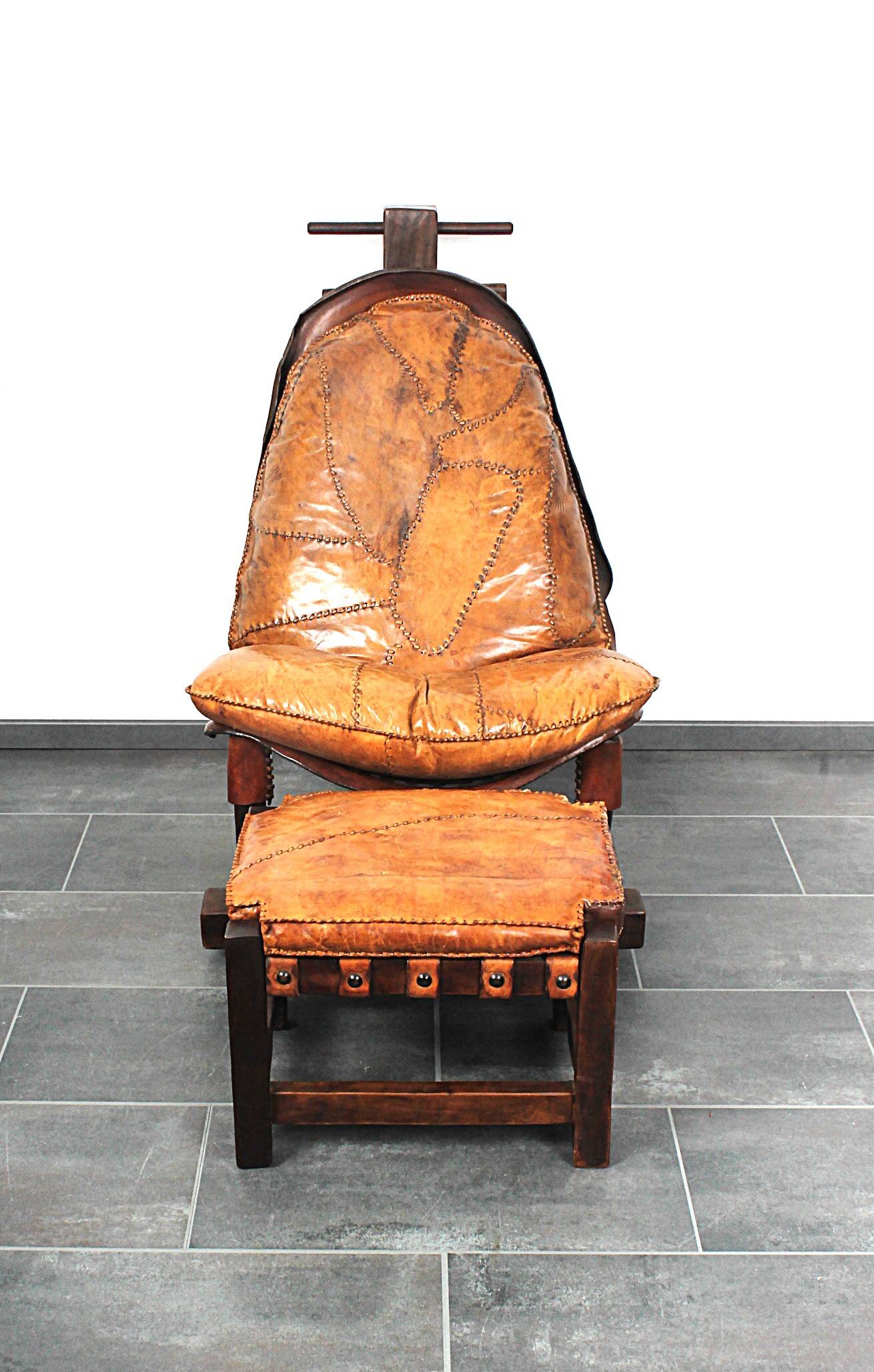 Brutalist oak lounge chair and ottoman, 1970s, set of 2