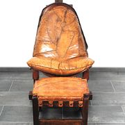Brutalist oak lounge chair and ottoman, 1970s, set of 2