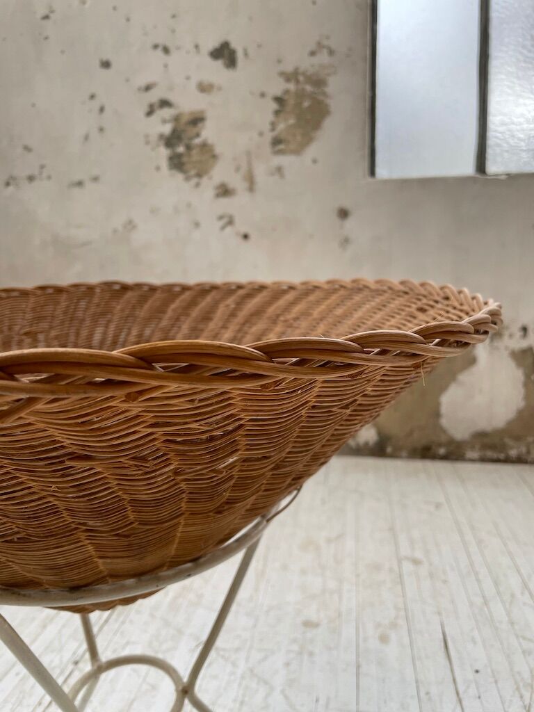 Wicker garden basket on tripod support