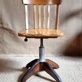 Height-adjustable rotating workshop office chair