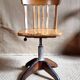 Height-adjustable rotating workshop office chair