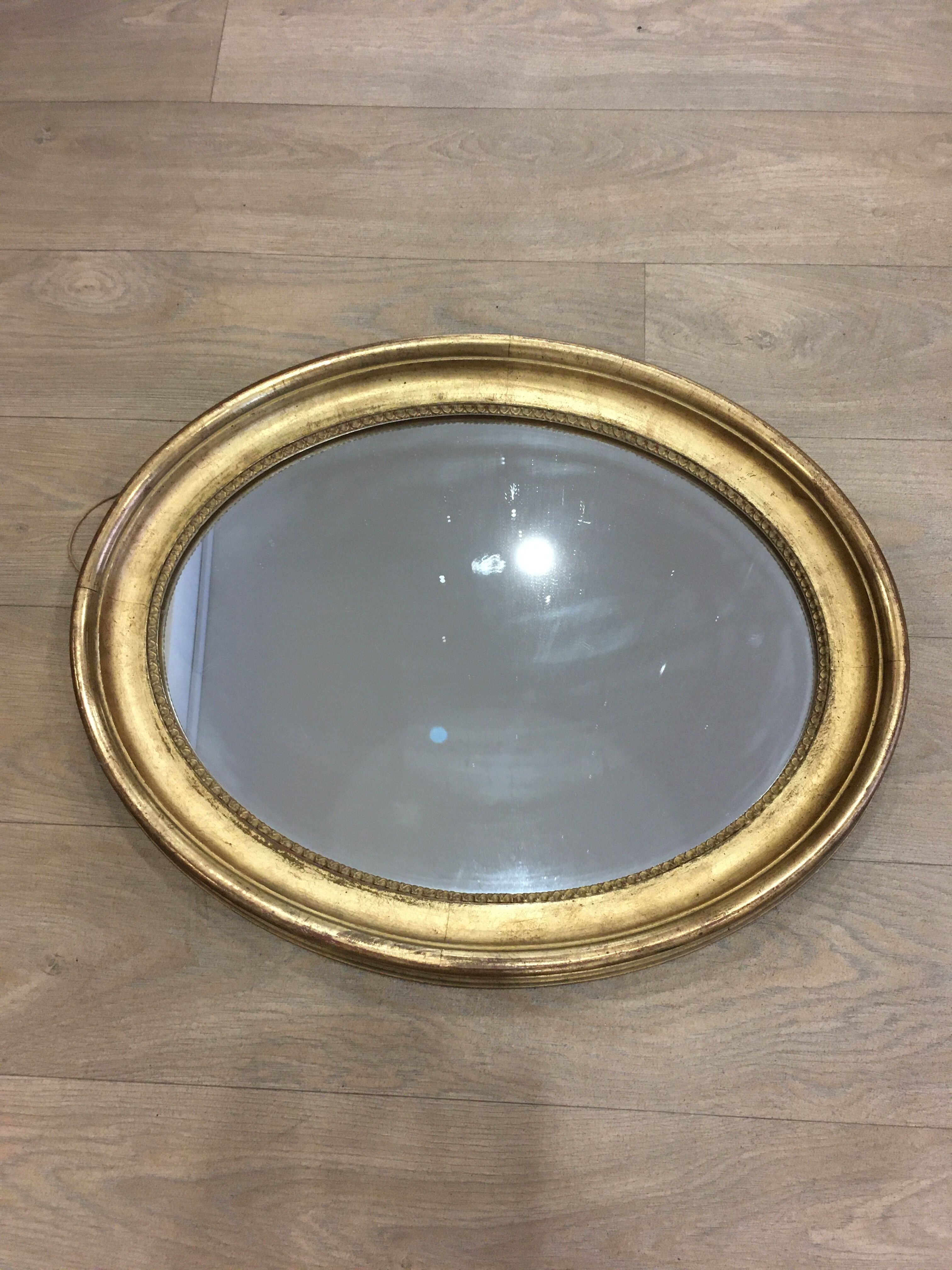 Old mirror gilded wooden frame.