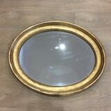 Old mirror gilded wooden frame.