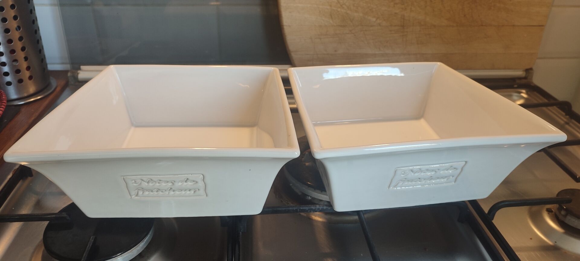 Two asymmetrical square gratin dishes BCI numbered, Made in France