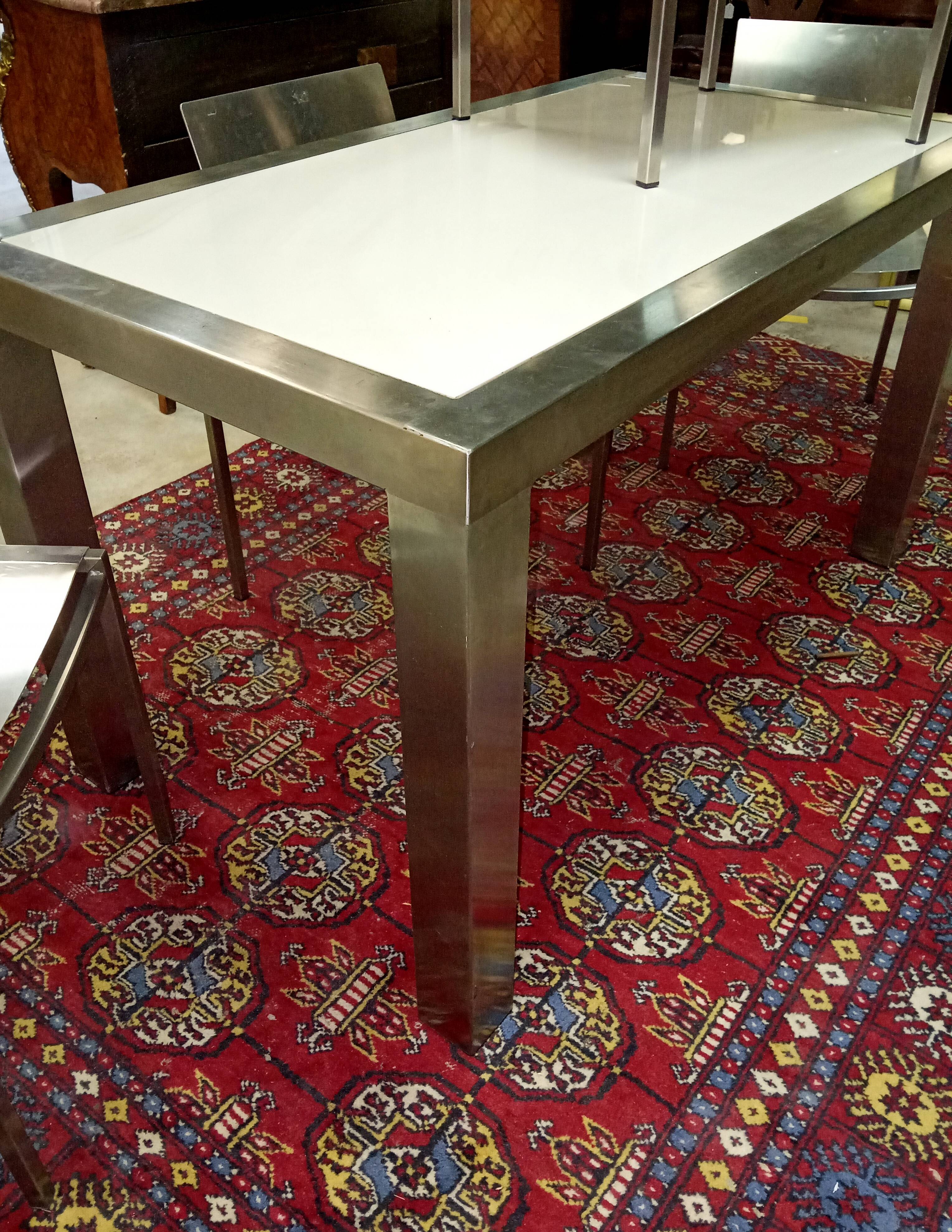 Design dining room set in brushed steel – Table and four chairs